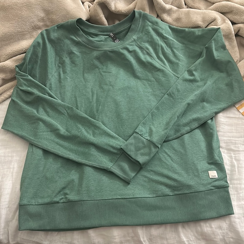 green pullover